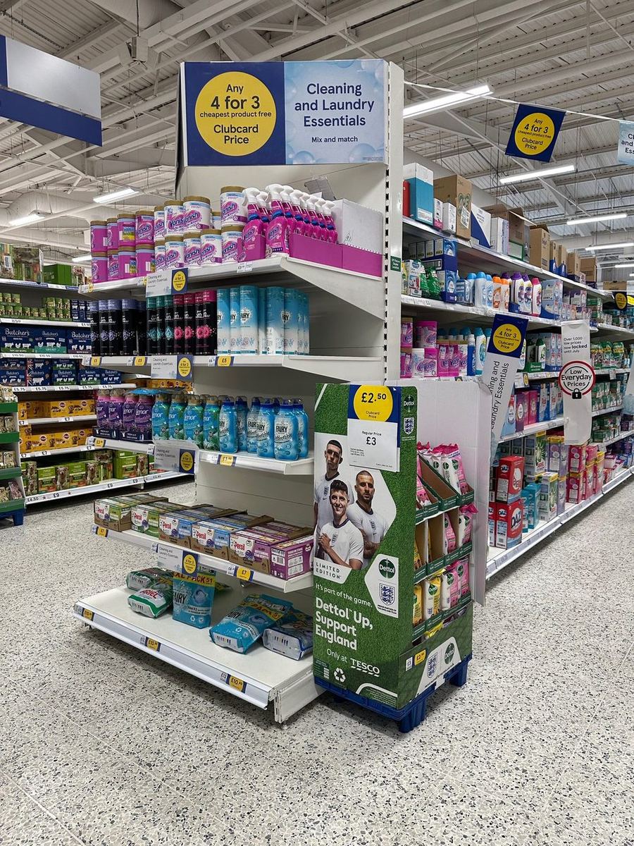 a display of cleaning products in a grocery store