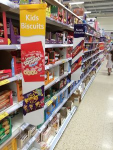 There is already sub division in the aisle, so this easy money taken by Tesco for supplier branded PoS.