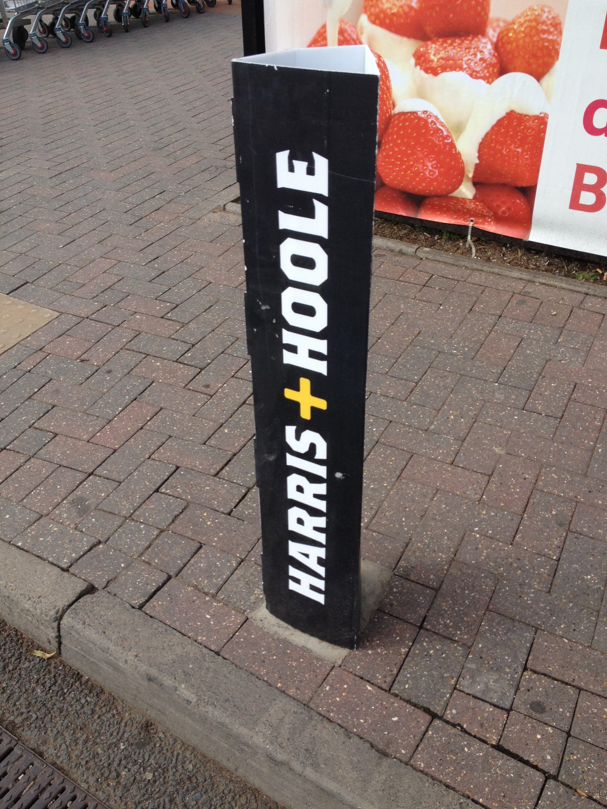 H&H is advertised on car park pillars. 
